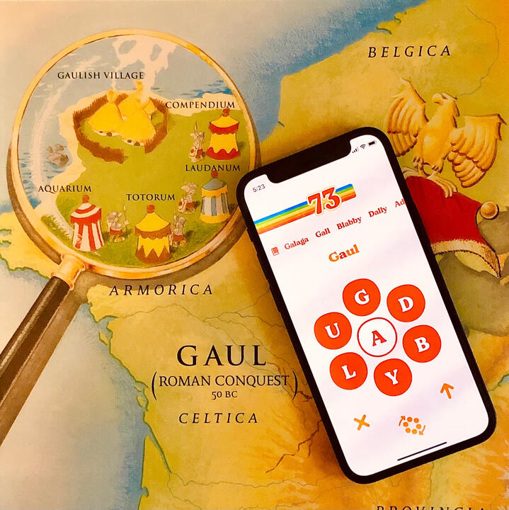 iPhone displaying Retrogram game screen over a map of ancient Gaul